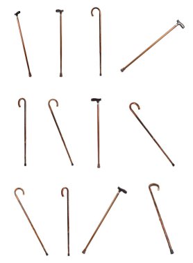 Beyaz arkaplanda zarif tahta bastonlarla kurulmuş.