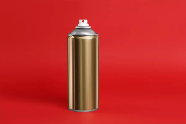 Golden Can Spray Paint Red Background — Stock Photo, Image