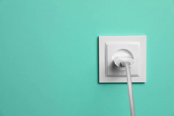 Power Socket Inserted Plug Turquoise Wall Space Text Electrical Supply — Foto de Stock