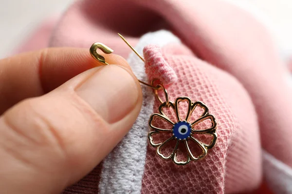 Woman Pinning Evil Eye Amulet Clothing Closeup — Stock Photo, Image