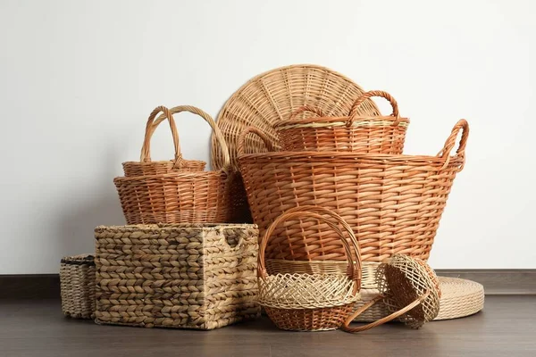 Many Different Wicker Baskets Made Natural Material Floor Light Wall — Stock Photo, Image