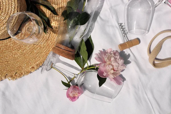 Flat Lay Composition Beautiful Peonies Wineglasses White Fabric — Zdjęcie stockowe