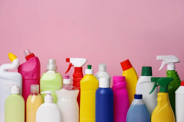 Many Bottles Different Detergents Pink Background Cleaning Supplies — Fotografia de Stock
