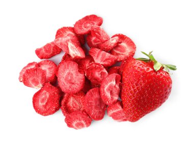Sweet sublimated and fresh strawberries on white background, top view