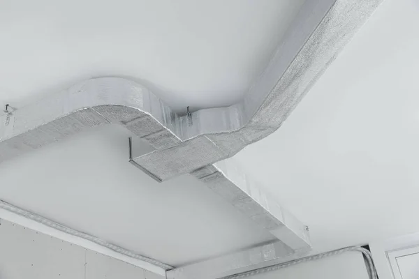 Ceiling with ventilation system indoors, low angle view