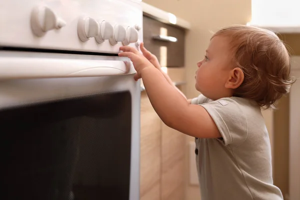 Little Child Playing Gas Stove Indoors Dangers Kitchen — 스톡 사진