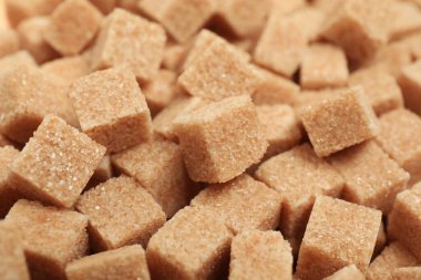 Esmer şeker küpleri arkaplan olarak, yakın görünüm