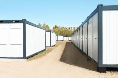 New modular houses for internally displaced persons outdoors clipart