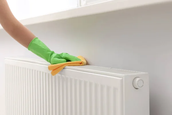 Woman Cleaning Radiator Rag Indoors Closeup Space Text — Foto Stock