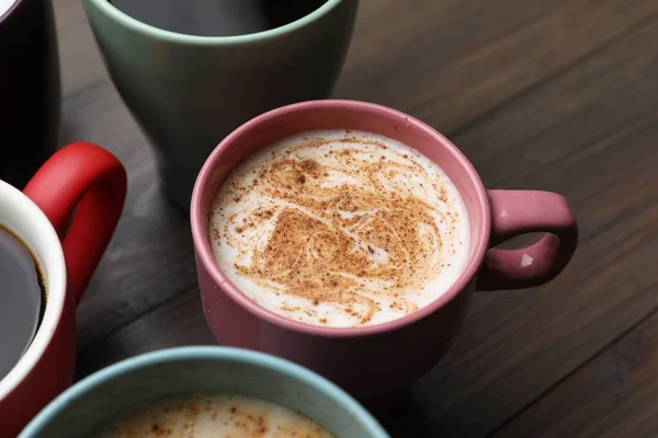 Many Different Cups Aromatic Hot Coffee Wooden Table — ストック写真