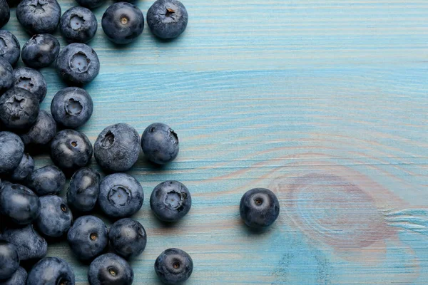 Tasty Fresh Blueberries Light Blue Wooden Table Flat Lay Space — Stock Photo, Image