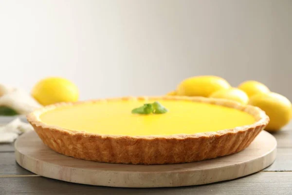 Delicious homemade lemon pie on wooden table