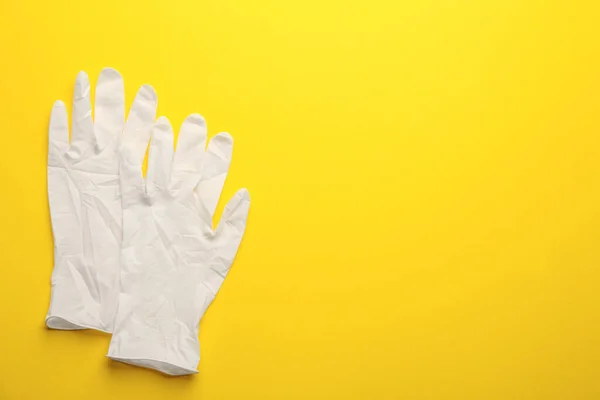 Pair Medical Gloves Yellow Background Flat Lay Space Text — Stock Photo, Image