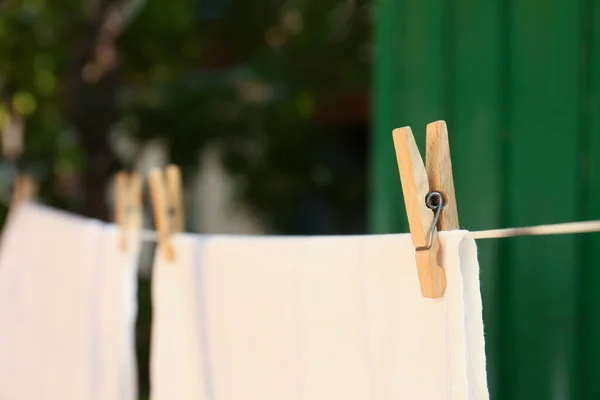 Washing Line Clean Laundry Clothespins Outdoors Closeup Space Text — Stock fotografie