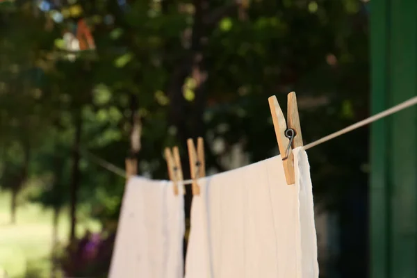 Washing Line Clean Laundry Clothespins Outdoors Closeup — Stok fotoğraf