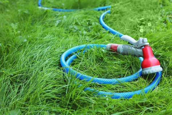 Watering Hose Sprinkler Green Grass Outdoors Space Text — Foto de Stock
