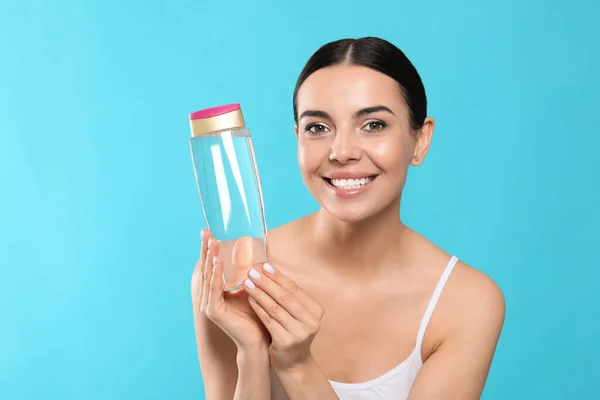 Young Woman Bottle Micellar Water Light Blue Background — Photo