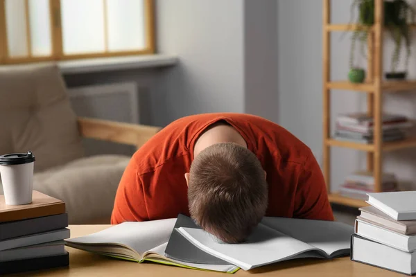 Tired Man Sleeping Books Wooden Table Indoors — Stock Photo, Image