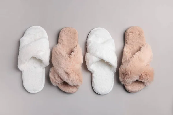 Different Soft Fluffy Slippers Light Grey Background Flat Lay — Stock Photo, Image