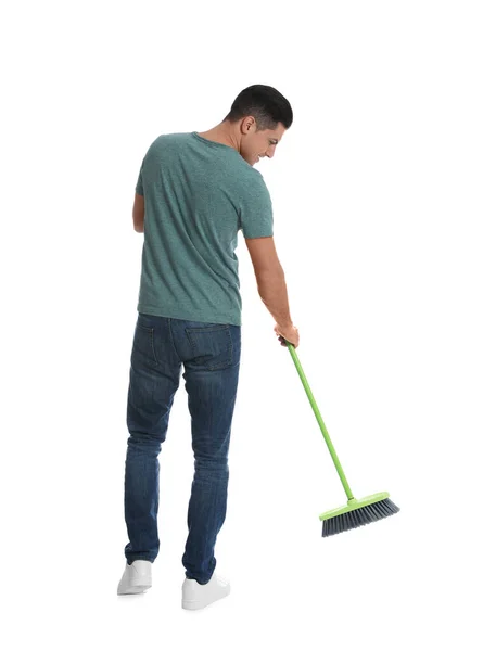 Hombre Con Escoba Verde Sobre Fondo Blanco — Foto de Stock