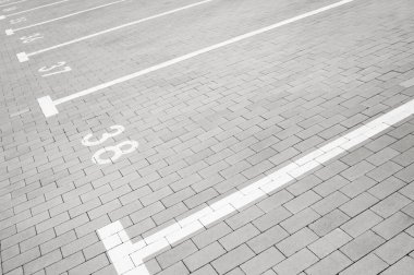 Outdoor car parking lots with white marking lines clipart