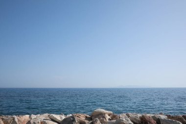 Beautiful view of rocky beach and calm sea on sunny day