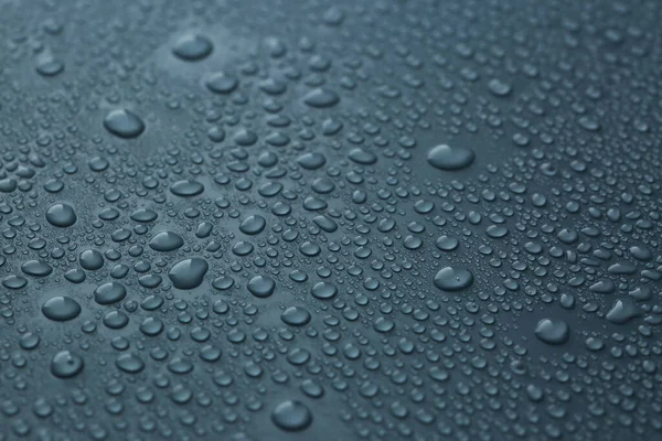 Muchas Gotas Agua Sobre Fondo Azul Oscuro Polvoriento Primer Plano — Foto de Stock