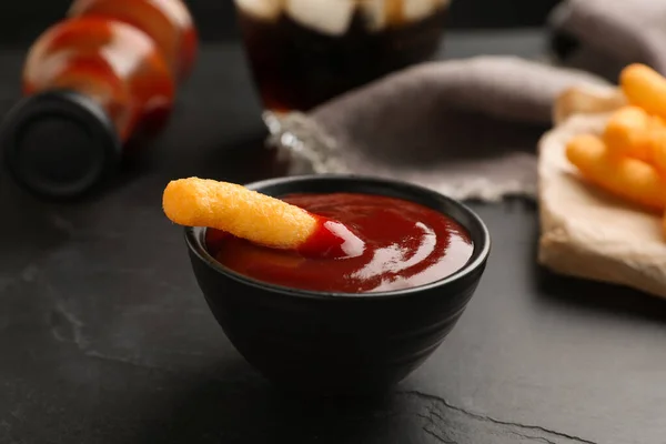 Tasty Cheesy Corn Stick Bowl Red Sauce Black Table Closeup — 图库照片