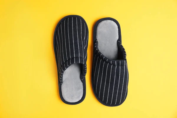 Pair Stylish Slippers Yellow Background Top View — Stock Photo, Image