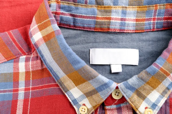 Blank Clothing Label Checkered Shirt Top View — Φωτογραφία Αρχείου