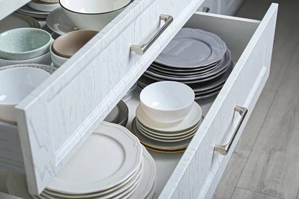 Open Drawers Different Plates Bowls Kitchen Closeup — 图库照片