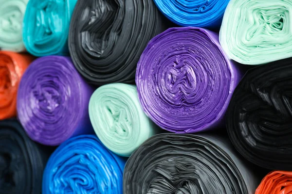 Rolls Different Color Garbage Bags Background Closeup — ストック写真