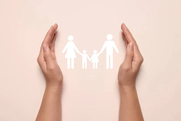Woman Holding Hands Paper Silhouette Family Light Pink Background Top — Stock Photo, Image