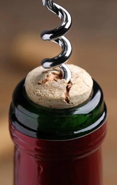 Opening Wine Bottle Corkscrew Blurred Background Closeup — Stockfoto