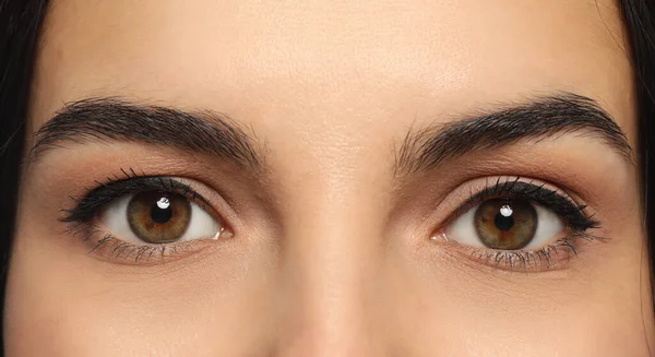 Young Woman Permanent Eyeliner Makeup Closeup — стоковое фото