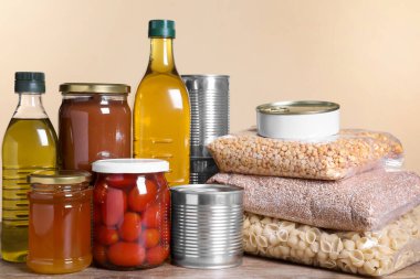 Different products on wooden table. Food donation