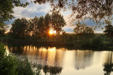 Picturesque view of countryside with river in morning