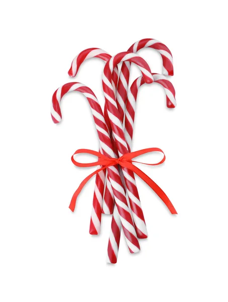 Sweet Christmas Snoep Stokken Met Rode Strik Witte Achtergrond Bovenaanzicht — Stockfoto