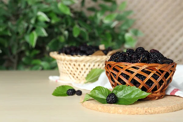 Wicker Basket Delicious Ripe Black Mulberries White Table Space Text — Stock Photo, Image