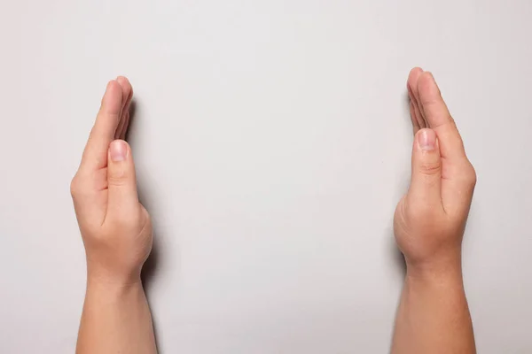 Woman Holding Light Grey Background Closeup Hands Space Text — Stock Photo, Image