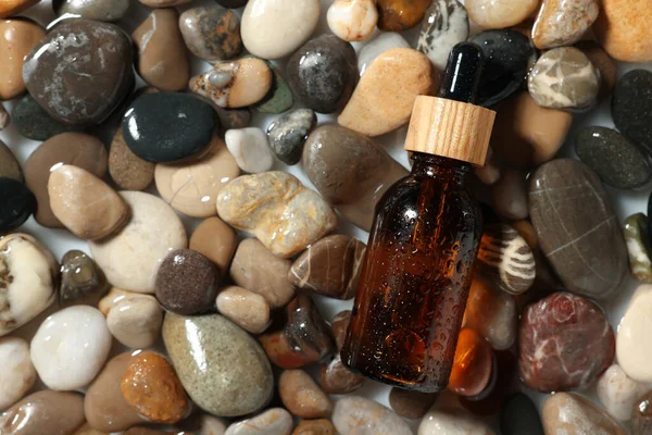 Bottle Cosmetic Product Wet Stones Top View Space Text — Stockfoto