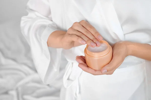 Woman Taking Hand Cream Jar Indoors Closeup — Stok fotoğraf