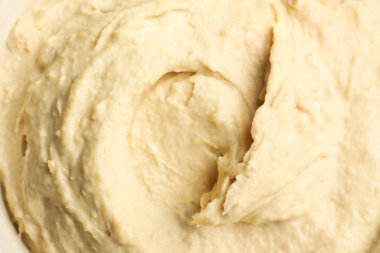 Arka plan olarak klasik lezzetli humus, üst görünüm
