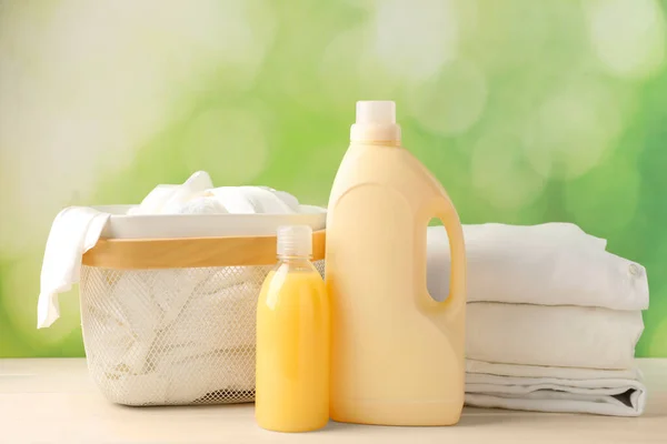 Bottles Laundry Detergents Clean Clothes White Wooden Table — Stock Photo, Image