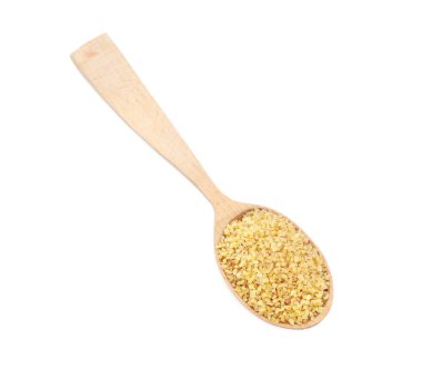 Ahşap kaşık, pişmemiş bulgur ile beyaz, üst manzara
