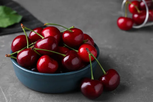 Fresh Ripe Cherries Grey Table Closeup — стоковое фото