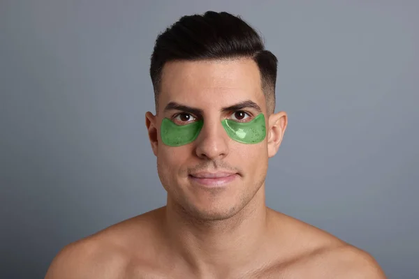 Man Green Eye Patches Grey Background — Stock Photo, Image