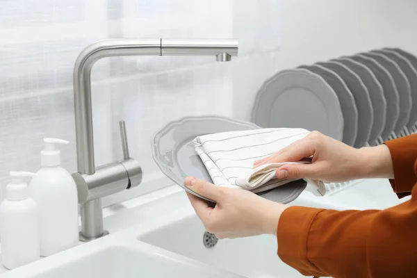 Woman Wiping Plate Towel Sink Kitchen Closeup —  Fotos de Stock