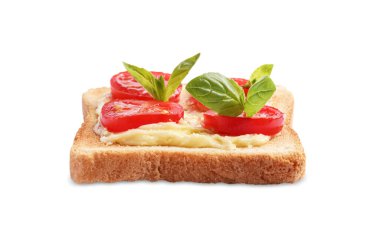 Tereyağlı, domatesli ve bembeyaz fesleğenli lezzetli tost.