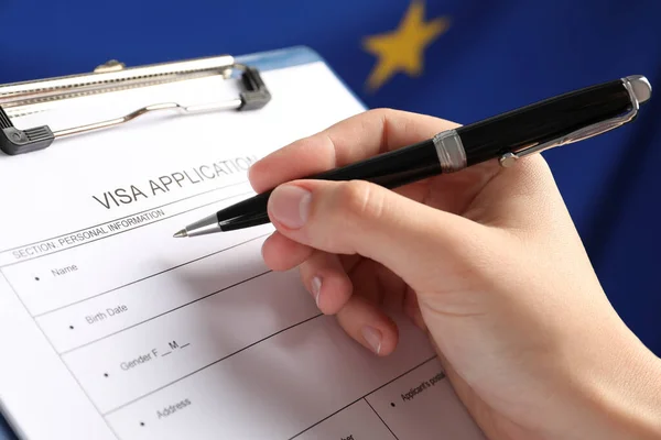 Woman Filling Visa Application Form Flag European Union Closeup — ストック写真